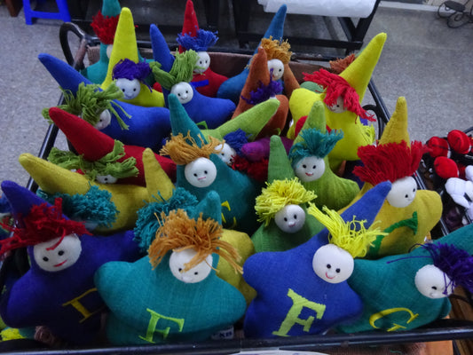 Petite poupée tissée en forme d'étoile